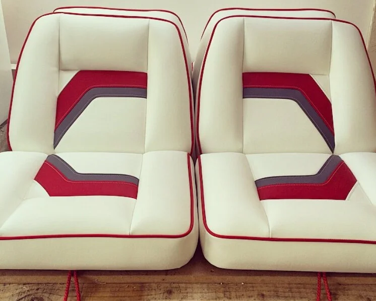Cream marine seats with red and grey geometric detailing